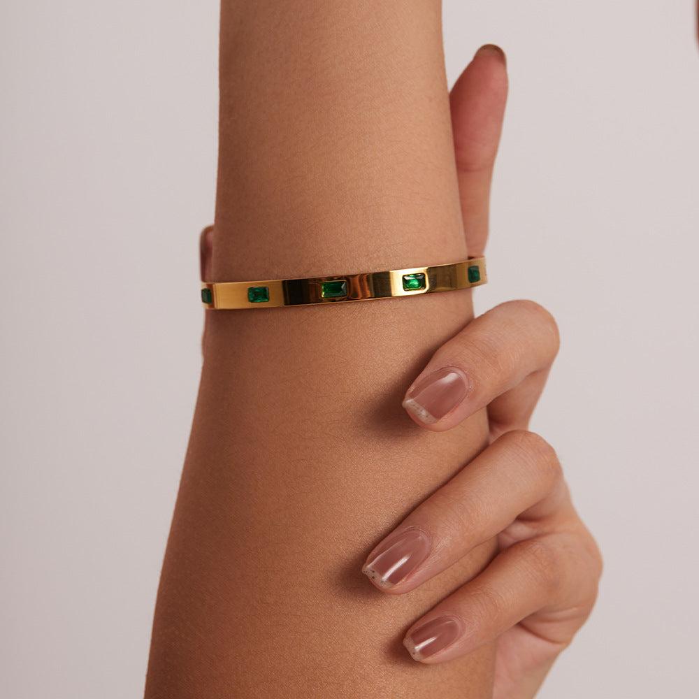 Gold Bangle Bracelet with Green Gemstone